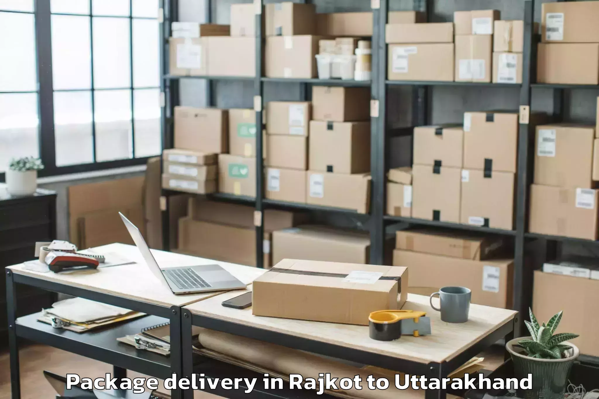 Professional Rajkot to Dit University Dehradun Package Delivery